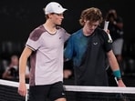 Jannik Sinner, left, of Italy is congratulated by Andrey Rublev of Russia following their quarterfinal match at the Australian Open Jannik Sinner, left, of Italy is congratulated by Andrey Rublev of Russia following their quarterfinal match at the Australian Open