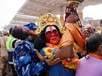 A Hindu devotee waits to enter the Lord Ram temple after its inauguration in Ayodhya on January 23. 