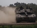 Israeli military spokesperson Rear Admiral Daniel Hagari told reporters in Tel Aviv that the militants' rockets hit a building where Israeli forces had laid explosives. (AP) Israeli military spokesperson Rear Admiral Daniel Hagari told reporters in Tel Aviv that the militants' rockets hit a building where Israeli forces had laid explosives. (AP)