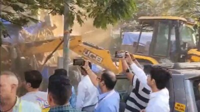 The alleged illegal structures were razed by the Mumbai Municipal Corporation. (ANI) The alleged illegal structures were razed by the Mumbai Municipal Corporation. (ANI)