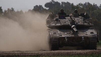 Israeli military spokesperson Rear Admiral Daniel Hagari told reporters in Tel Aviv that the militants' rockets hit a building where Israeli forces had laid explosives. (AP)