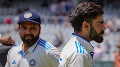 Indian captain Rohit Sharma with teammate Virat Kohli during the presentation ceremony at the end of the 2-match Test cricket series, known as The Freedom Series, between India and South Africa (PTI) Indian captain Rohit Sharma with teammate Virat Kohli during the presentation ceremony at the end of the 2-match Test cricket series, known as The Freedom Series, between India and South Africa (PTI)