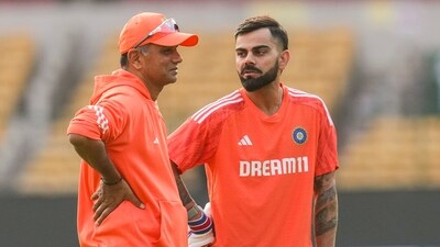 (FILE) India's Virat Kohli with head coach Rahul Dravid during a practice session (PTI) (FILE) India's Virat Kohli with head coach Rahul Dravid during a practice session (PTI)