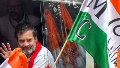 Congress leader Rahul Gandhi waves at supporters during the Bharat Jodo Nyay Yatra, in Guwahati (PTI) Congress leader Rahul Gandhi waves at supporters during the Bharat Jodo Nyay Yatra, in Guwahati (PTI)