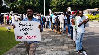 Sri Lankan social media activists hold placards with slogans against the proposed Online Safety Bill during a protest near the Parliament in Colombo, Sri Lanka. (AP) Sri Lankan social media activists hold placards with slogans against the proposed Online Safety Bill during a protest near the Parliament in Colombo, Sri Lanka. (AP)