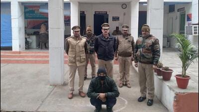The suspect in police custody on Tuesday. (HT Photo) The suspect in police custody on Tuesday. (HT Photo)