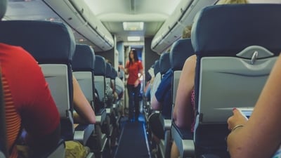 The woman realised that she was on the same flight as her boss after she landed. (Representational image/@Unsplash)