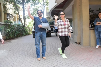 Kareena Kapoor and Saif Ali Khan waves at paparazzi. (Varinder Chawla) Kareena Kapoor and Saif Ali Khan waves at paparazzi. (Varinder Chawla)