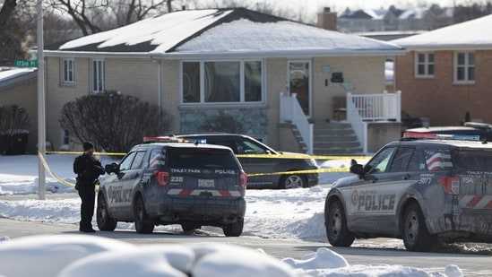 Police work at the scene of a shooting in Tinley Park on Sunday, Jan. 21, 2024 (Eileen T. Meslar/Chicago Tribune via AP) (AP)