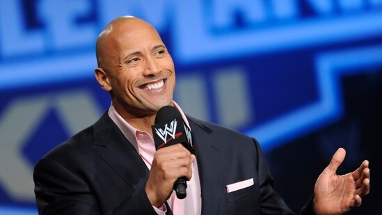 Actor and former WWE Superstar Dwayne "The Rock" Johnson participates in a Wrestlemania XXVII press conference (AP)