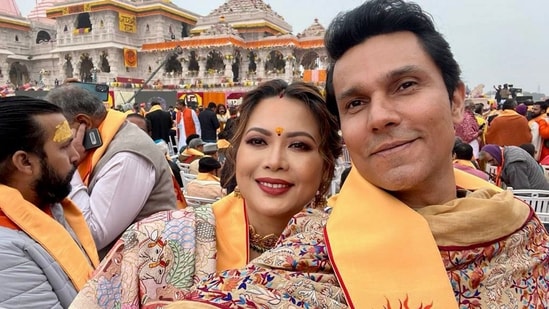 Randeep Hooda and wife Lin Laishram attended the Ram Mandir ceremony in ethnic ensembles. Lin looked lovely in a saree and sindoor and gold jewellery.&nbsp;(PTI)