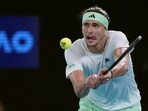 Alexander Zverev of Germany plays a backhand return to Carlos Alcaraz of Spain during their quarterfinal match at the Australian Open Alexander Zverev of Germany plays a backhand return to Carlos Alcaraz of Spain during their quarterfinal match at the Australian Open