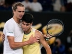Alexander Zverev, left, of Germany is congratulated by Carlos Alcaraz of Spain following their quarterfinal match at the Australian Open Alexander Zverev, left, of Germany is congratulated by Carlos Alcaraz of Spain following their quarterfinal match at the Australian Open