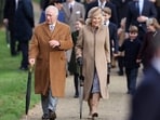 King Charles III (L) and Britain's Queen Camilla (C) arrive for the Royal Family's traditional Christmas Day service. King Charles III (L) and Britain's Queen Camilla (C) arrive for the Royal Family's traditional Christmas Day service.