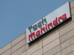Tech Mahindra logo is seen on its office building in Noida on the outskirts of New Delhi, India March 7, 2019.