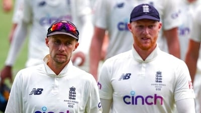 England's Joe Root, left, walks from the field with captain Ben Stokes (AP) England's Joe Root, left, walks from the field with captain Ben Stokes (AP)