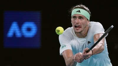 Alexander Zverev of Germany plays a backhand return to Carlos Alcaraz of Spain during their quarterfinal match at the Australian Open (AP) Alexander Zverev of Germany plays a backhand return to Carlos Alcaraz of Spain during their quarterfinal match at the Australian Open (AP)