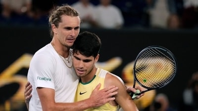 Alexander Zverev, left, of Germany is congratulated by Carlos Alcaraz of Spain following their quarterfinal match at the Australian Open (AP) Alexander Zverev, left, of Germany is congratulated by Carlos Alcaraz of Spain following their quarterfinal match at the Australian Open (AP)