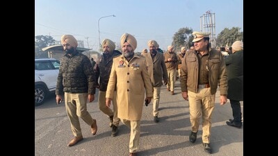 Police personnel during a flag march in Mohali on Tuesday. (HT Photo) Police personnel during a flag march in Mohali on Tuesday. (HT Photo)
