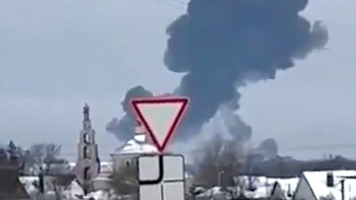 Belgorod Plane Crash: Smoke rises from the scene of a warplane crash at a residential area near Yablonovo, Belgorod region. (AP) Belgorod Plane Crash: Smoke rises from the scene of a warplane crash at a residential area near Yablonovo, Belgorod region. (AP)