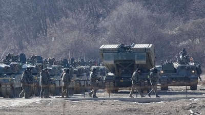South Korean army soldiers pass by their armored vehicles during a military exercise in Paju, South Korea, near the border with North Korea, Wednesday, Jan. 24, 2024. (AP Photo/Ahn Young-joon) (AP) South Korean army soldiers pass by their armored vehicles during a military exercise in Paju, South Korea, near the border with North Korea, Wednesday, Jan. 24, 2024. (AP Photo/Ahn Young-joon) (AP)