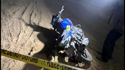 The motorcycle used by the suspects to rob a husband and wife, who were travelling by car on canal road near NH-9 (HT Photo) The motorcycle used by the suspects to rob a husband and wife, who were travelling by car on canal road near NH-9 (HT Photo)