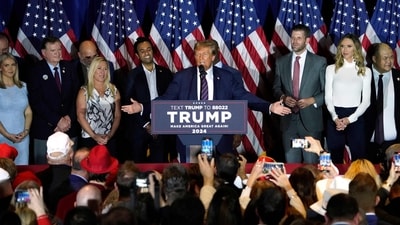 Republican presidential hopeful and former US President Donald Trump gestures as he speaks during an Election Night Party in Nashua, New Hampshire, on January 23, 2024. Donald Trump won the key New Hampshire primary Tuesday, moving him ever closer to locking in the Republican presidential nomination and securing an extraordinary White House rematch with Joe Biden. (Photo by TIMOTHY A. CLARY / AFP) (AFP) Republican presidential hopeful and former US President Donald Trump gestures as he speaks during an Election Night Party in Nashua, New Hampshire, on January 23, 2024. Donald Trump won the key New Hampshire primary Tuesday, moving him ever closer to locking in the Republican presidential nomination and securing an extraordinary White House rematch with Joe Biden. (Photo by TIMOTHY A. CLARY / AFP) (AFP)