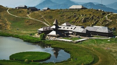 Prashar Lake, Himachal Pradesh: Nestled in the Dhauladhar range of the Himalayas, this lake is surrounded by lush greenery and snow-capped peaks. The area is known for its tranquil ambience, making it a perfect retreat for nature lovers and those seeking solitude. The nearby temple adds a touch of spirituality to the serene landscape. (Unsplash) Prashar Lake, Himachal Pradesh: Nestled in the Dhauladhar range of the Himalayas, this lake is surrounded by lush greenery and snow-capped peaks. The area is known for its tranquil ambience, making it a perfect retreat for nature lovers and those seeking solitude. The nearby temple adds a touch of spirituality to the serene landscape. (Unsplash)