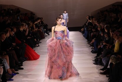 A model presents a creation by Giorgio Armani Prive during the Women's Haute-Couture Spring/Summer 2024 Fashion Week in Paris on January 23, 2024. (Photo by Emmanuel Dunand / AFP) A model presents a creation by Giorgio Armani Prive during the Women's Haute-Couture Spring/Summer 2024 Fashion Week in Paris on January 23, 2024. (Photo by Emmanuel Dunand / AFP)