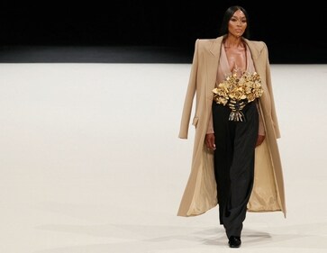 British model Naomi Campbell presents a creation for Balmain Menswear Ready-to-wear Fall-Winter 2024/2025 collection show as part of the Paris Fashion Week, at the Grande halle de la Villette in Paris on January 20, 2024. (Photo by ALAIN JOCARD / AFP) British model Naomi Campbell presents a creation for Balmain Menswear Ready-to-wear Fall-Winter 2024/2025 collection show as part of the Paris Fashion Week, at the Grande halle de la Villette in Paris on January 20, 2024. (Photo by ALAIN JOCARD / AFP)