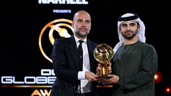 Manchester City Coach Pep Guardiola poses for a picture as he arrives to attend the 18th edition of the Globe Soccer Awards in the Gulf Emirate of Dubai on January 19, 2024. (Photo by Ryan LIM / AFP) (AFP)