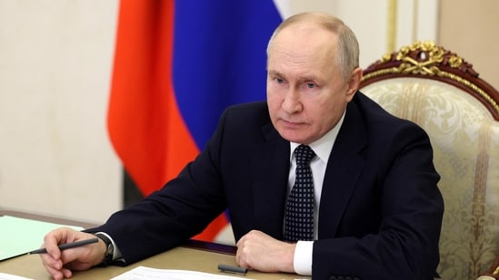Russian president Vladimir Putin chairs a meeting. (AFP)