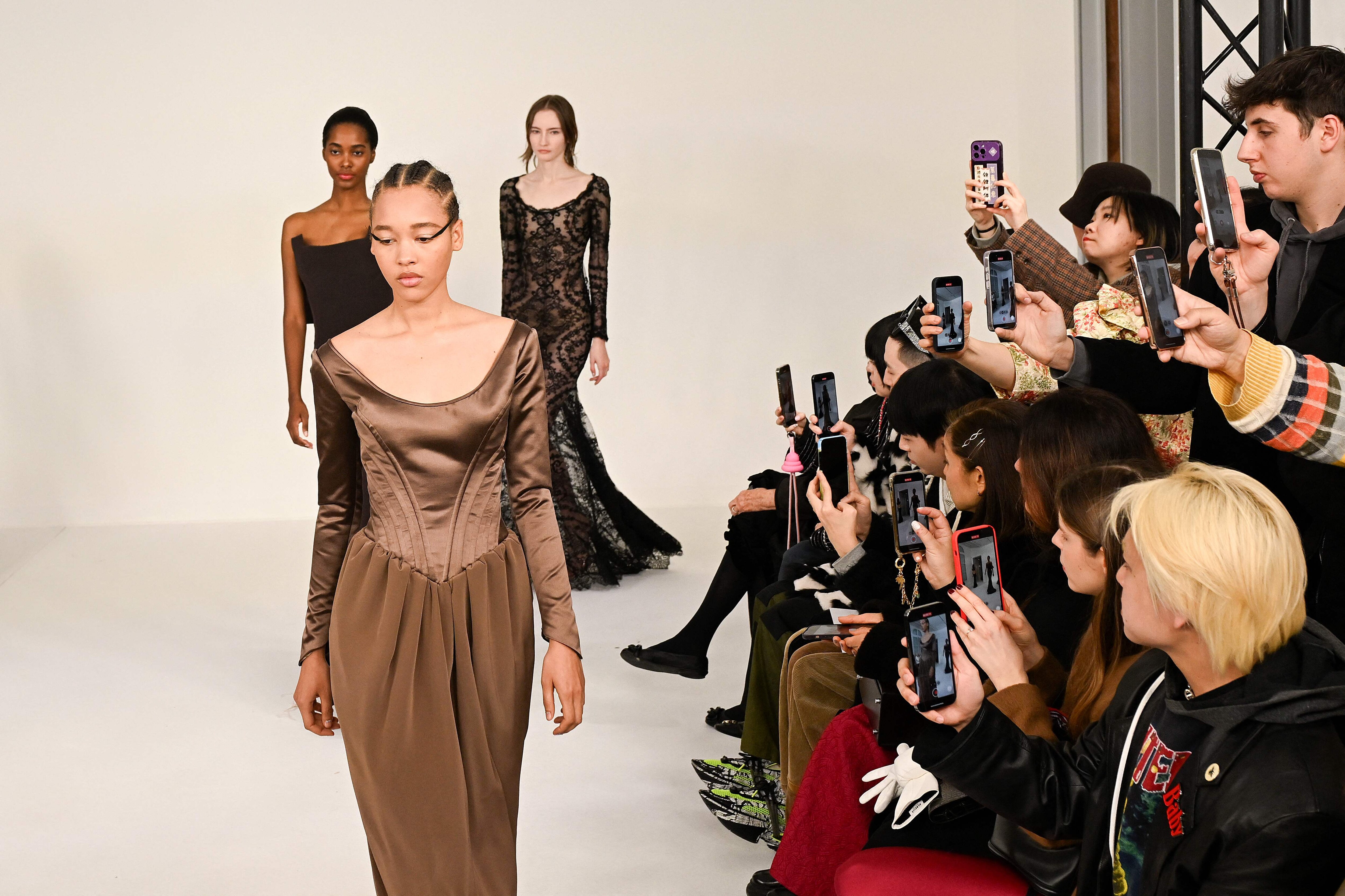 Models present a creation for Alexis Mabille during the Women's Haute-Couture Spring/Summer 2024 Fashion Week in Paris on January 23, 2024.(Photo by Miguel MEDINA / AFP) Models present a creation for Alexis Mabille during the Women's Haute-Couture Spring/Summer 2024 Fashion Week in Paris on January 23, 2024.(Photo by Miguel MEDINA / AFP)