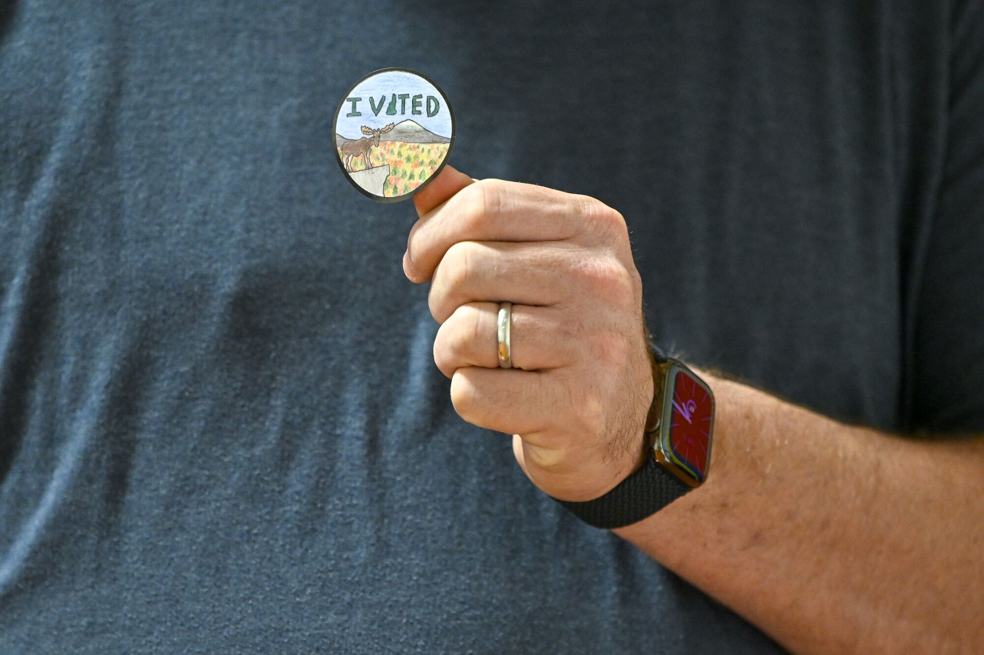 A voter holds up an "I Voted" sticker after casting their ballot at a polling station inside the New Searles Elementary School in Nashua, New Hampshire, US, on Tuesday, Jan. 23, 2024. Photographer: Gaelen Morse/Bloomberg (Bloomberg) A voter holds up an "I Voted" sticker after casting their ballot at a polling station inside the New Searles Elementary School in Nashua, New Hampshire, US, on Tuesday, Jan. 23, 2024. Photographer: Gaelen Morse/Bloomberg (Bloomberg)
