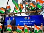 A hoarding put up ahead of French President Emmanuel Macron and Prime Minister Narendra Modi’s visit to Jaipur, on Wednesday. (PTI)