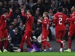 Liverpool's Colombian midfielder #07 Luis Diaz (L) celebrates with Liverpool's Uruguayan striker #09 Darwin Nunez after scoring the opening goal during the English League Cup demi-final second leg football match between Fulham and Liverpool at Craven Cottage stadium, in London