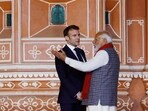 Prime Minister Narendra Modi and France's President Emmanuel Macron talk during their visit to the Hawa Mahal. Prime Minister Narendra Modi and France's President Emmanuel Macron talk during their visit to the Hawa Mahal.
