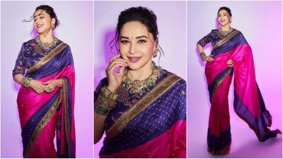 Madhuri Dixit is the ultimate queen of saree fashion, who always hits the ethnic fashion targets like a pro. The gorgeous actress is a total stunner and often turns heads with her elegant and sartorial looks. Just a day ago, Madhuri wowed her fans in a yellow mirrored work saree and this time she effortlessly rocked a vibrant purple and pink saree. Madhuri is quite active on social media and her glamorous Insta-diaries filled with stylish ethnic looks are a treasure trove of fashion inspiration for all her fans. Her latest look, draped in six yards of grace, exudes royal vibes and is sure to win your heart (Instagram/@madhuridixitnene) Madhuri Dixit is the ultimate queen of saree fashion, who always hits the ethnic fashion targets like a pro. The gorgeous actress is a total stunner and often turns heads with her elegant and sartorial looks. Just a day ago, Madhuri wowed her fans in a yellow mirrored work saree and this time she effortlessly rocked a vibrant purple and pink saree. Madhuri is quite active on social media and her glamorous Insta-diaries filled with stylish ethnic looks are a treasure trove of fashion inspiration for all her fans. Her latest look, draped in six yards of grace, exudes royal vibes and is sure to win your heart (Instagram/@madhuridixitnene)