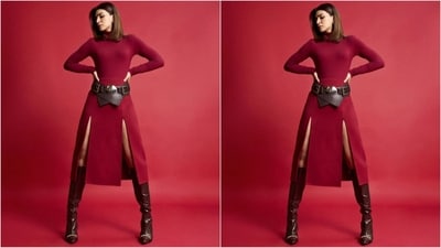 Kriti's monochromatic attire features a full-sleeved maroon turtle-neck top, which she paired with a high-waisted mini skirt with double thigh-high slits on each side, showing off a sultry flash of leg and adding a glam factor to her ensemble. Her look is the perfect mix of sass and sophistication. (Instagram/@kritisanon) Kriti's monochromatic attire features a full-sleeved maroon turtle-neck top, which she paired with a high-waisted mini skirt with double thigh-high slits on each side, showing off a sultry flash of leg and adding a glam factor to her ensemble. Her look is the perfect mix of sass and sophistication. (Instagram/@kritisanon)