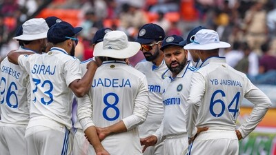 India's captain Rohit Sharma (2R) speaks with his teammates (AFP) India's captain Rohit Sharma (2R) speaks with his teammates (AFP)