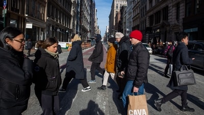 Shoppers and pedestrians on Broadway in the Soho neighborhood of New York, US, on Monday, Jan. 22, 2024. US consumers rang in the new year with a good dose of optimism about the economy, their incomes and the inflation outlook, driving a gauge of confidence to a more than two-year high. Photographer: Shelby Knowles/Bloomberg (Bloomberg)