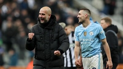 Manchester City manager Pep Guardiola celebrates with Mateo Kovacic after the match (REUTERS)