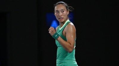 China's Zheng Qinwen reacts while playing against Ukraine's Dayana Yastremska during their women's singles semi-final match on day 12 of the Australian Open tennis tournament in Melbourne on January 25 (AFP)
