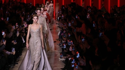 Models present creations by Elie Saab during the Women's Haute-Couture Spring/Summer 2024 Fashion Week in Paris, on January 24, 2024. (Photo by Thomas SAMSON / AFP) Models present creations by Elie Saab during the Women's Haute-Couture Spring/Summer 2024 Fashion Week in Paris, on January 24, 2024. (Photo by Thomas SAMSON / AFP)