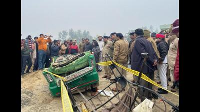 The damaged autorickshaw after its collision with a truck on a road, at Sugsugi village in Shahjahanpur district on Thursday. (PTI)