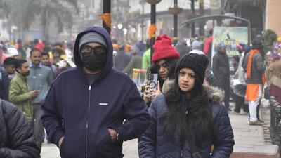 Tourists taking a stroll on Heritage Street near Golden Temple in Amritsar on Thursday. (Sameer Sehgal/HT)