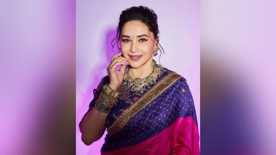 With the help of make-up artist Billy Manik, Madhuri got decked up in nude eyeshadow, winged eyeliner, mascaraed lashes, darkened eyebrows, blushed cheeks, luminous highlighter and a shade of glossy pink lipstick. (Instagram/@madhuridixitnene) With the help of make-up artist Billy Manik, Madhuri got decked up in nude eyeshadow, winged eyeliner, mascaraed lashes, darkened eyebrows, blushed cheeks, luminous highlighter and a shade of glossy pink lipstick. (Instagram/@madhuridixitnene)