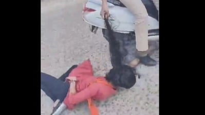 An ABVP activist was dragged by hair by two women cops in Rajendranagar, Hyderabad.
