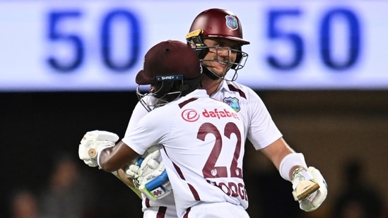 The West Indies' Joshua Da Silva, right, is congratulated by teammate Kavem Hodge