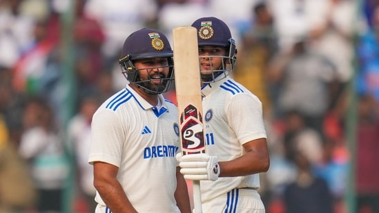 Hyderabad: India's Yashasvi Jaiswal celebrates his half century with captain Rohit Sharma on the first day of the first cricket test match between India and England, at Rajiv Gandhi International Cricket Stadium, in Hyderabad, Thursday, Jan. 25, 2024. (PTI Photo/Shailendra Bhojak) (PTI01_25_2024_000307B)(PTI)